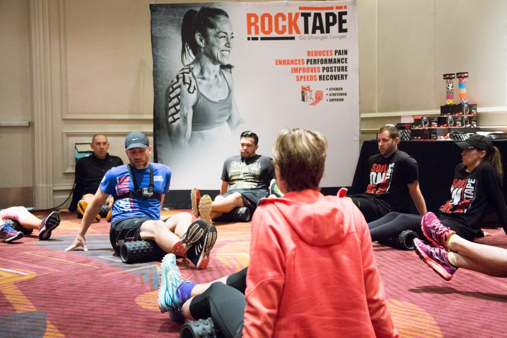 Conference goers attend a session by RockTape