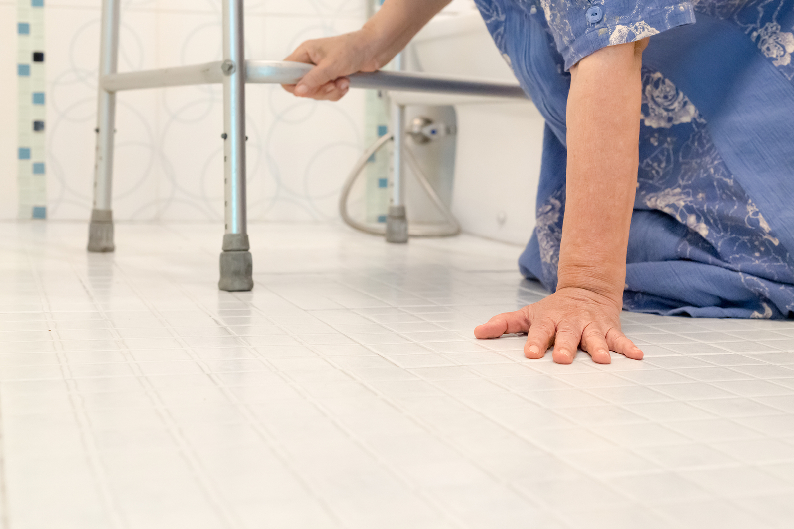 elderly falling in bathroom because slippery surfaces .