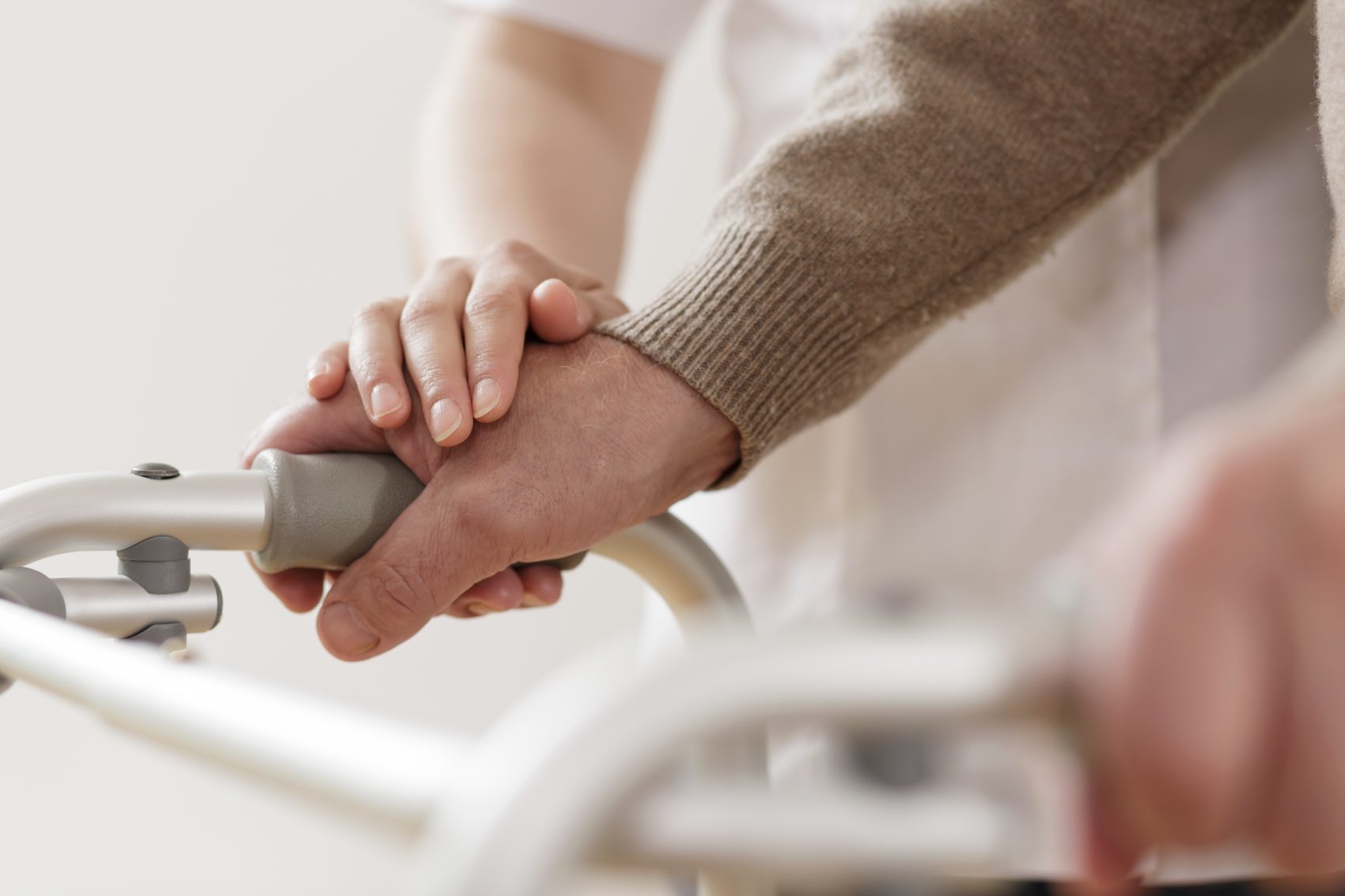Elderly lady with a zimmer frame
