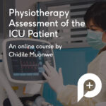 A clinician looking at a vital signs monitor in intensive care