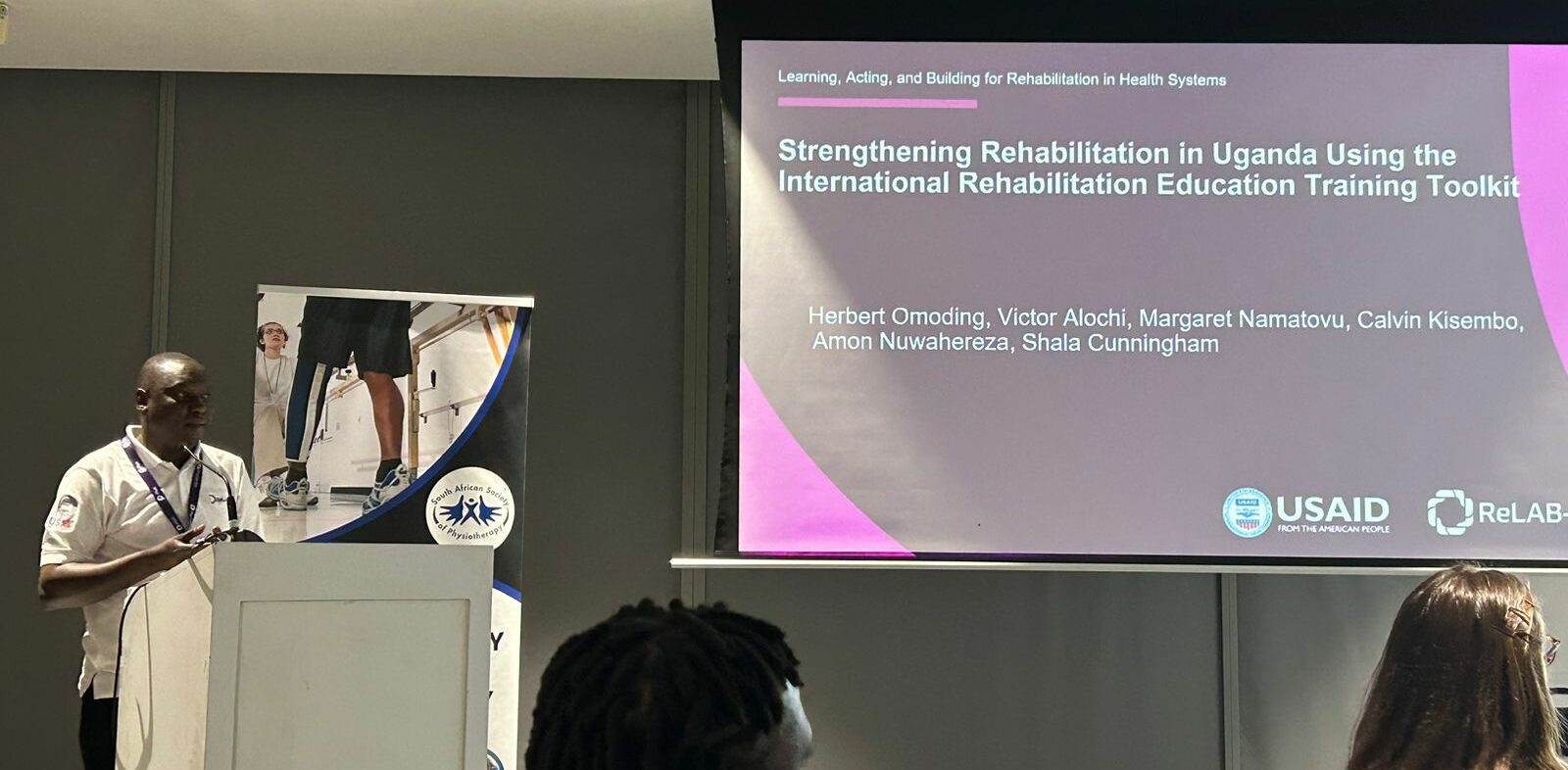Herbert Omoding presenting on Strenghtening the rehabilitation workforce in Uganda using the IRETT